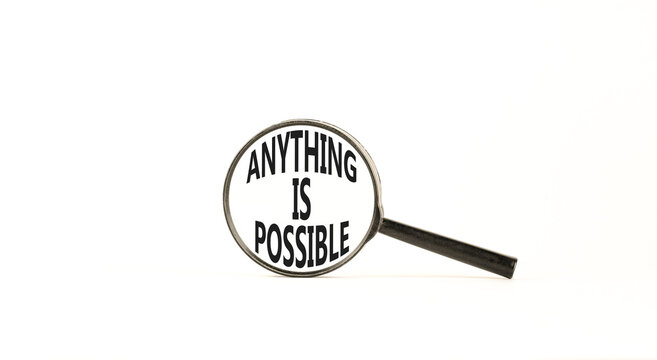Anything is possible symbol. Concept words Anything is possible in beautiful magnifying glass. Beautiful white table white background. Business anything possible concept. Copy space.