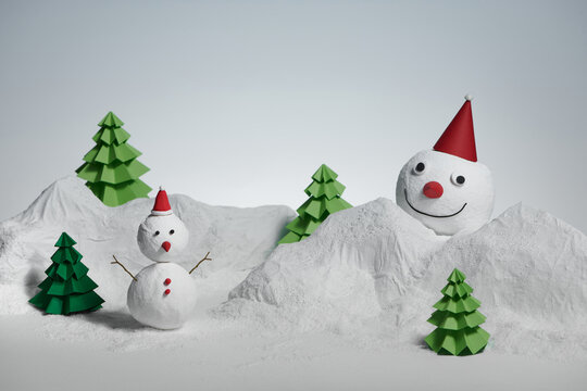 Two paper snowman and origami christmas tree  - Powered by Adobe