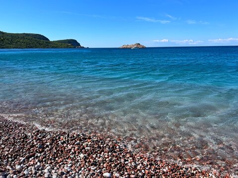 Pebble beach and blue sea.