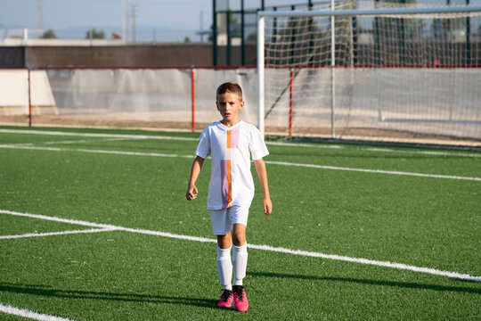 Kid playing a soccer 
