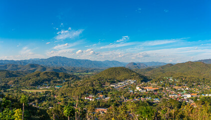 Fototapeta na wymiar View to the Tham Pla–Namtok Pha Suea National Park near the provincial capital of Mae Hong Son in northern Thailand. The Shan Hills stretch from Myanmar to Thailand