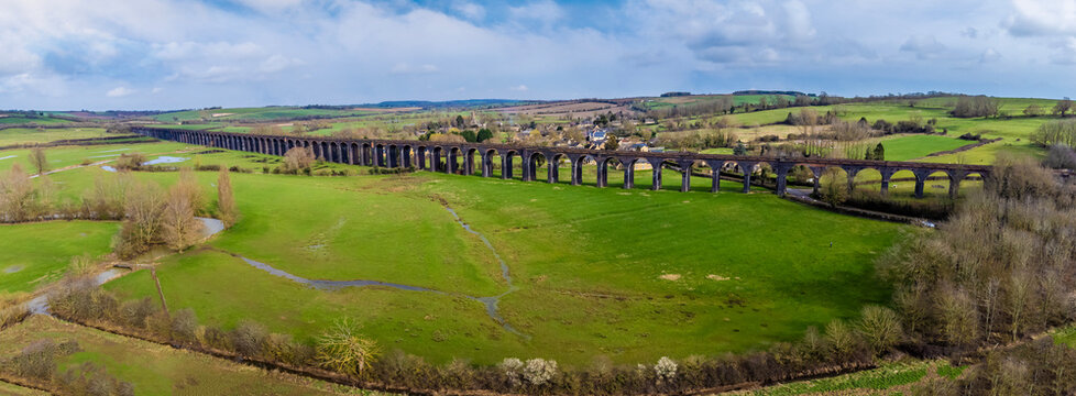 An aerial panorama view above the Welland Valley towards the spectacular Harringworth Viaduct on a bright winter day