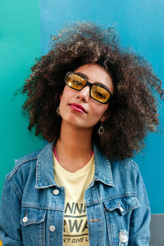 Smiling Middle Eastern woman in sunglasses