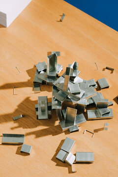 staples on wooden desk