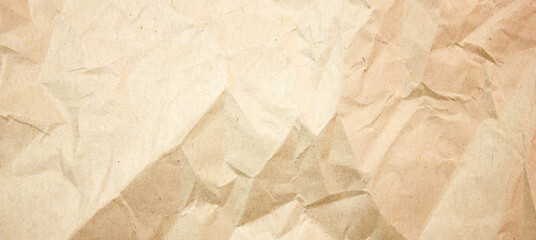 Authentic texture background of crumpled brown paper, packaging. Copy space crumpled paper.