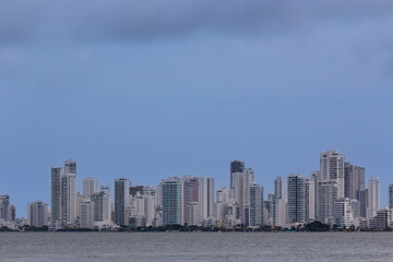 Fototapeta premium Cartagena's buildings seen from afar, allowing to appreciate its great and beautiful sea.