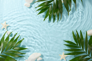 Tropical tranquility: a canvas of calm. Top view shot of green palm leaves, white stones, starfish...