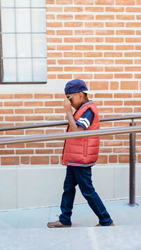 Going places in style with my vest and ballcap

