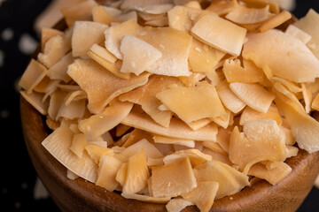 sweet orange and yellow coconut flakes fried in sugar