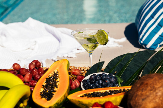 Fresh fruit platter and drink by the pool
