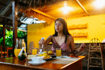 Woman Enjoying Dinner on Terrace