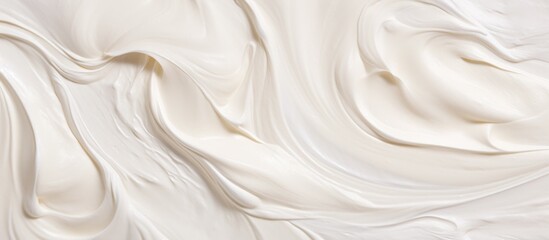 Obraz premium This close-up view showcases a white cream texture with numerous stunning marks on a creamy background. The intricate details of the paint create a visually interesting pattern.