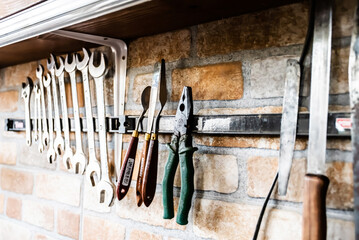 Wall with various carpentry tools.
