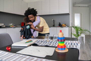 Father Hugging Daughter Before She Leaves To School