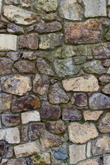 Old stone wall. Building stone walls, garden stone wall historical stone floors. Exterior wall stones.