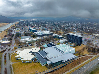 Corning, NY, USA - 03-02-2024 - Cloudy winter aerial image of the downtown area in the City of...