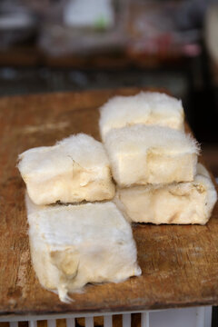Closeup of naturally fermented moldy tofu at a farmers market