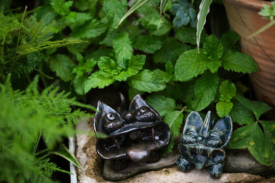 Closeup of Chinese Yunnan traditional handicraft, Wadang cat.