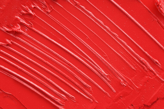Red glossy lipstick texture