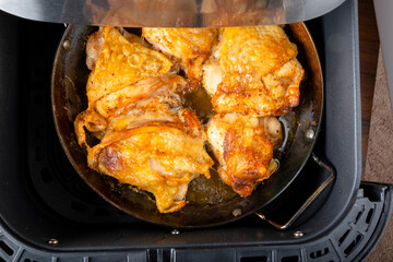 Crispy Perfection: 4K Ultra HD Image of Air Fryer Fried Chicken Thighs