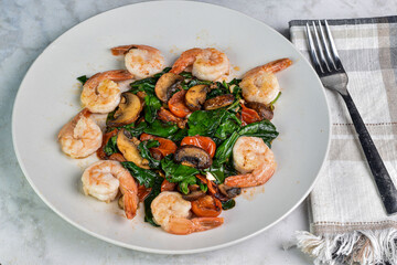 shrimp with  sauteed spinach, mushrooms and  tomatoes