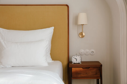 Bedroom Detail - Alarm Clock on Beautiful Wooden Nightstand