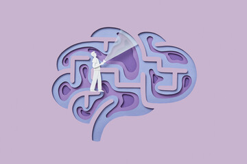 Papercraft male figure with flashlight walking inside human brain
