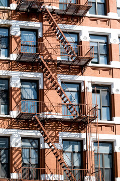 Exterior of brick building with balconies