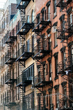 Exterior of brick building with balconies