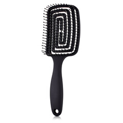 black anatomical comb on a white background