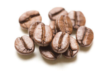 Aromatic Delight: 4K Ultra HD Image of Close-Up of Roasted Coffee Beans on White Background