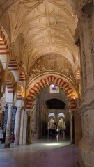 Fototapeta na wymiar Scalloped edges on an arch in the Mosque-Cathedral in Cordoba, Spain