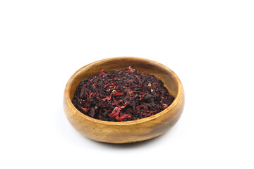 Karkade tea. Hibiscus tea leaves in wooden bowl isolated on white background. File contains clipping path. Top view.