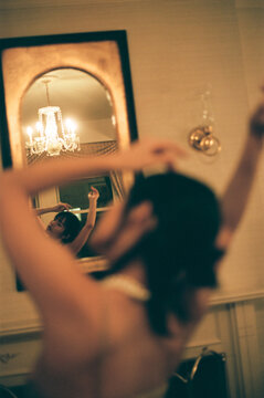 Girl Dancing in front of Mirror