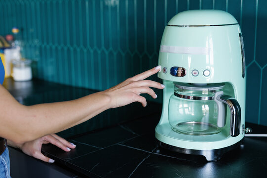 Anonymous appliance prepare coffee maker beverage mundane movement 