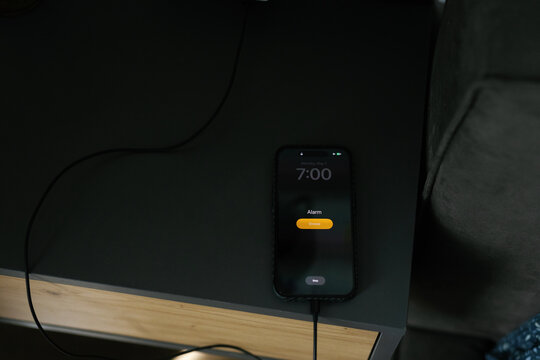Phone device alarm mundane habit morning bedroom gadget notification