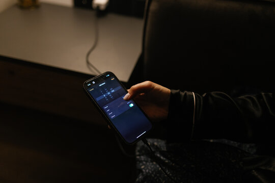 Setting alarms dark room evening rituals