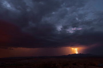 Naklejka na ściany i meble Electric Twilight: 4K Ultra HD Image of Stormy Weather Lightning at Sunset