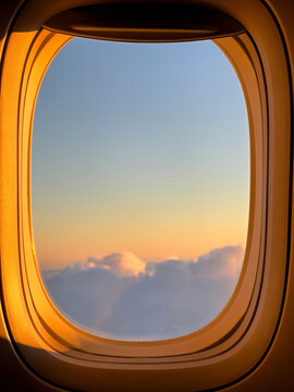 A sunset view from an airplane window