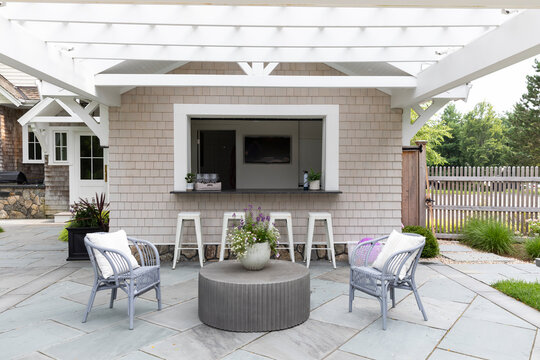 Residential luxury Home outdoor patio with pergola bar 