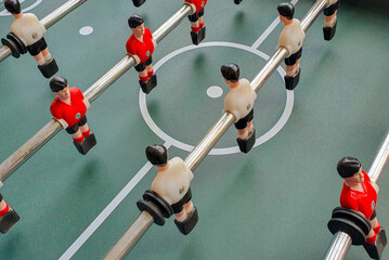 A close-up with an old football game on the table