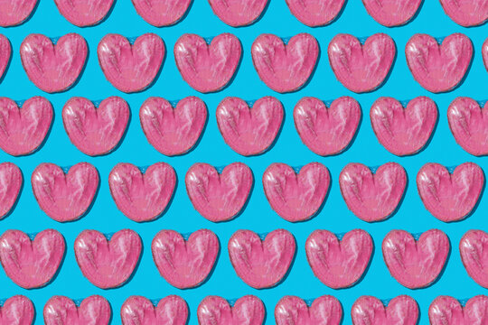 pattern of some heart-shaped pink palmier pastries