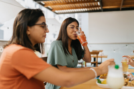 Friends enjoying lunch in a terrace