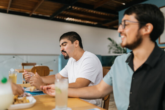 Friends enjoying lunch in a terrace
