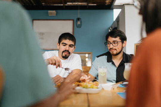 Friends enjoying lunch in a terrace