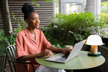 A Young Beautiful Woman Working On Laptop