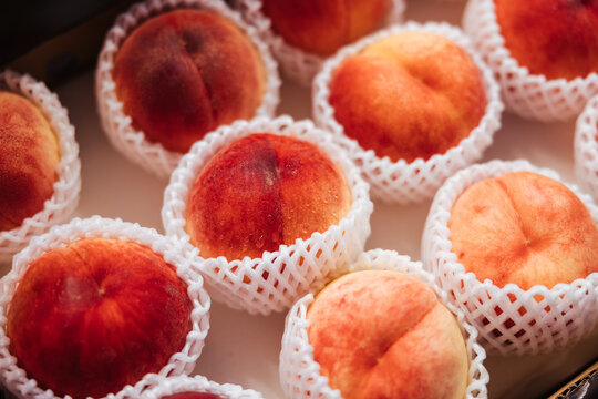 Fresh Peaches in Protective Wraps