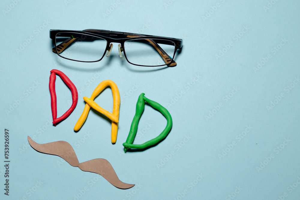 Fototapete a man's face is made out of various tools and a tie. the word 