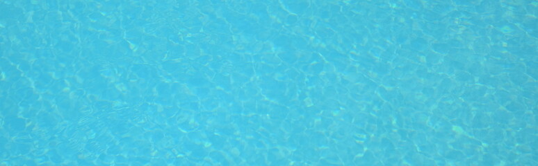 Swimming pool, swimming pool with blue chlorinated water, summer and bathing fun in the sunshine	