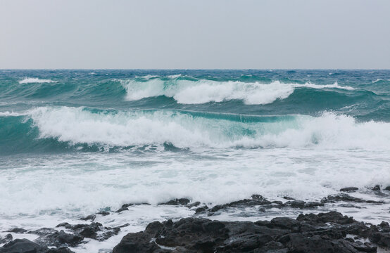 Close-up of big waves on the shore.